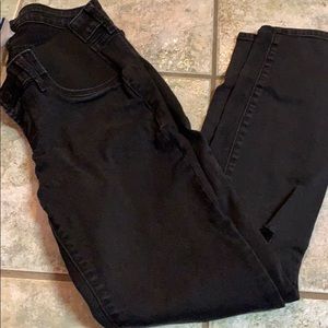 Black distressed maternity jeans.
